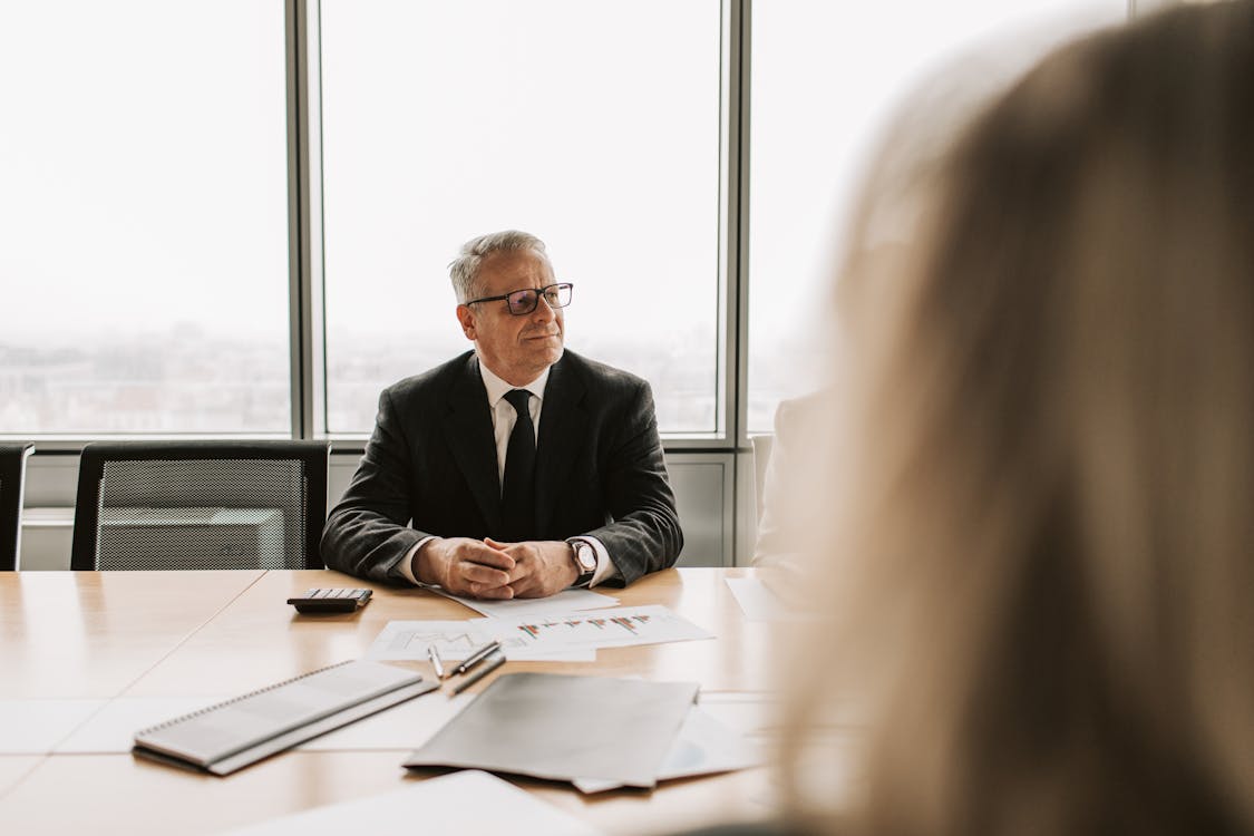 Free A Man Wearing a Black Suit Stock Photo