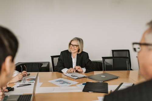 A Woman Sitting in the Office
