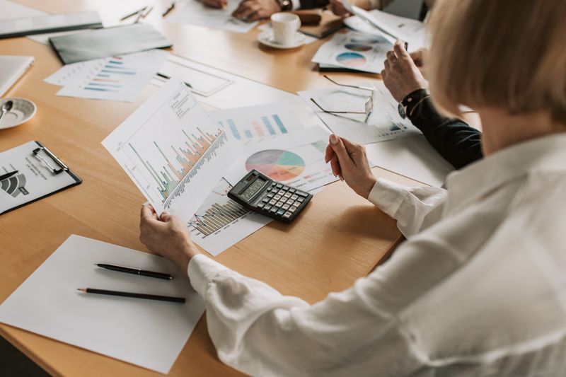 Advisors analysing growth data and charts