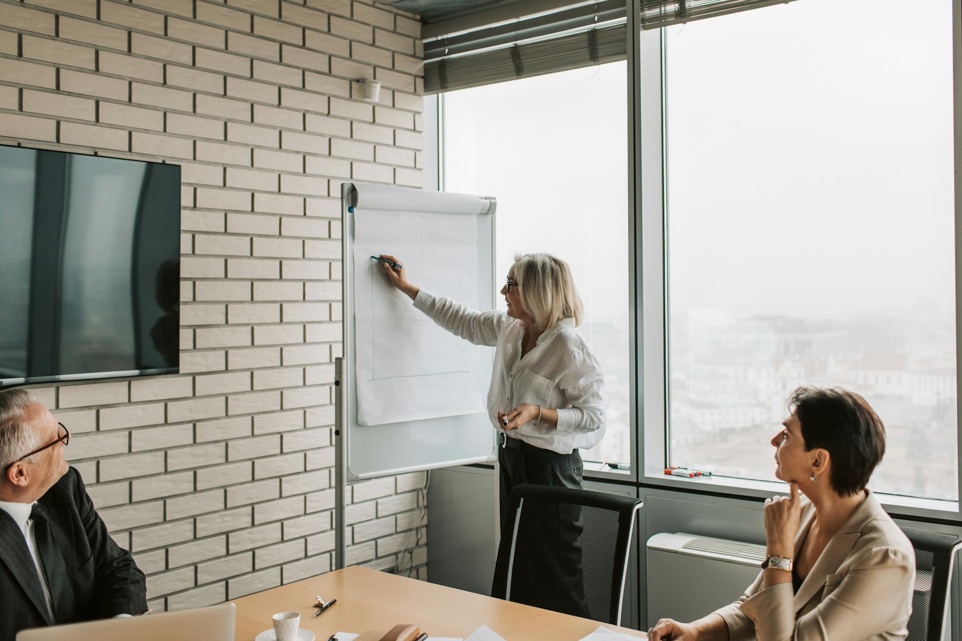 Corporate team working and brainstorming during a business meeting.