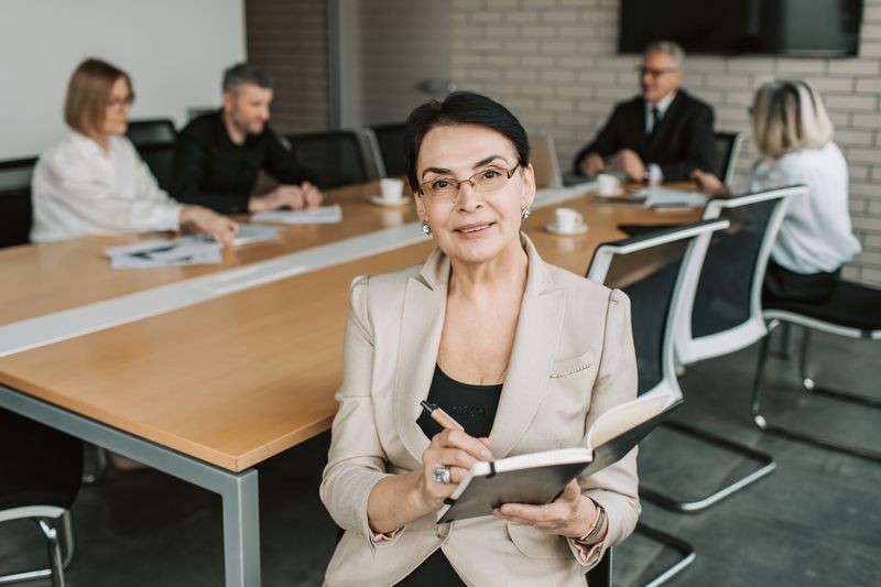 Senior businesswoman leading a coaching session