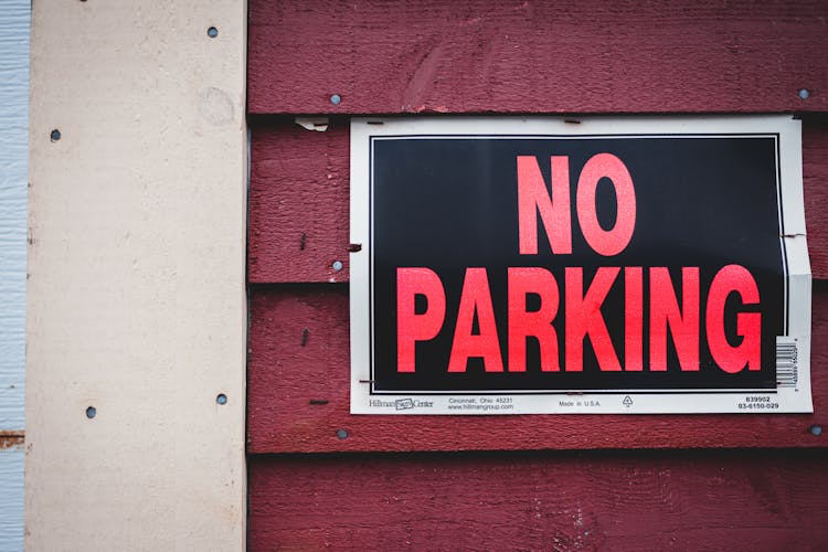 No Parking Sign On Wall