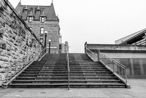 Free Grayscale Photo of a Concrete Staircase Stock Photo