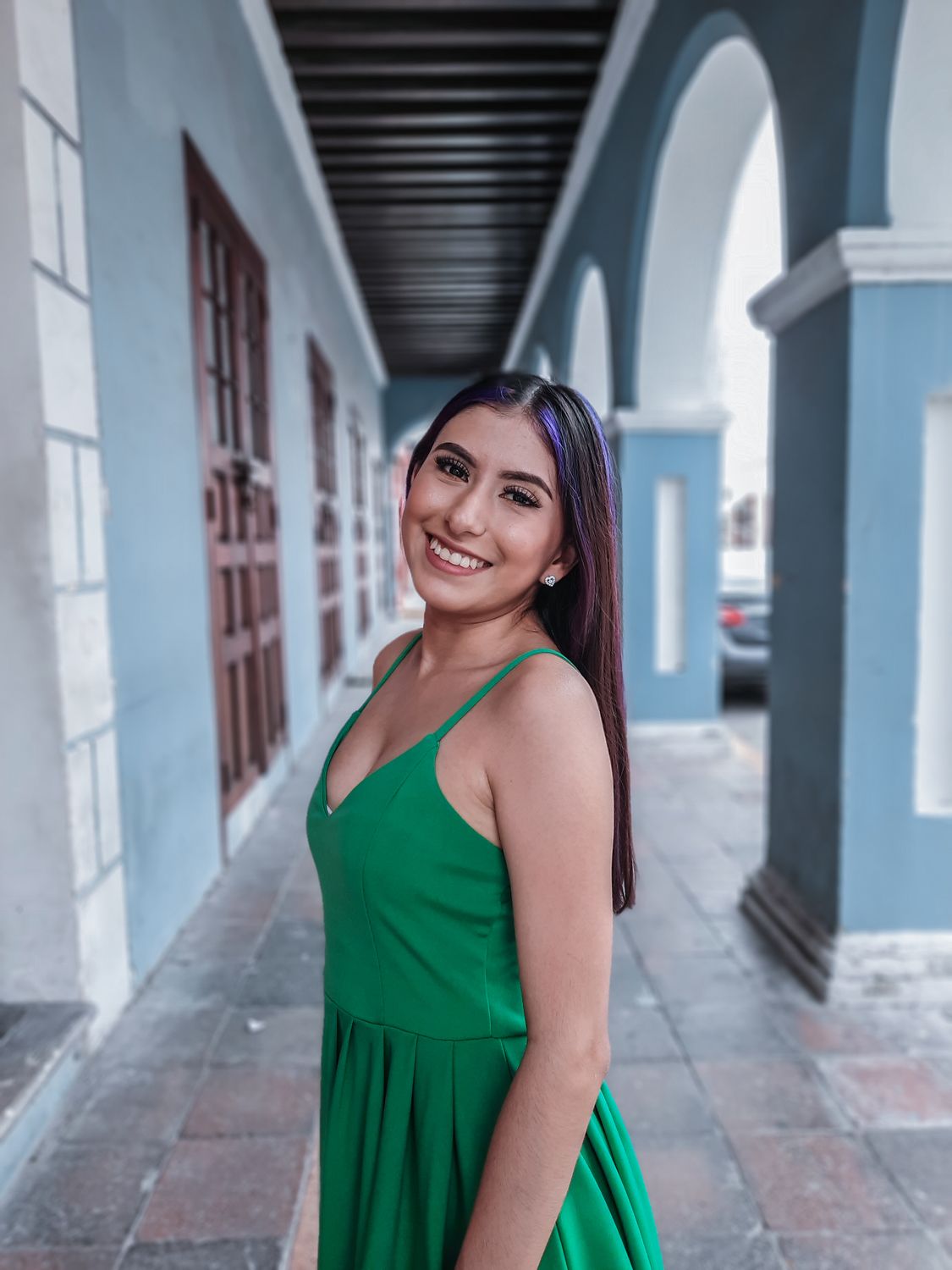A Woman in Green Sleeveless Dress Standing on Hallway · Free Stock Photo