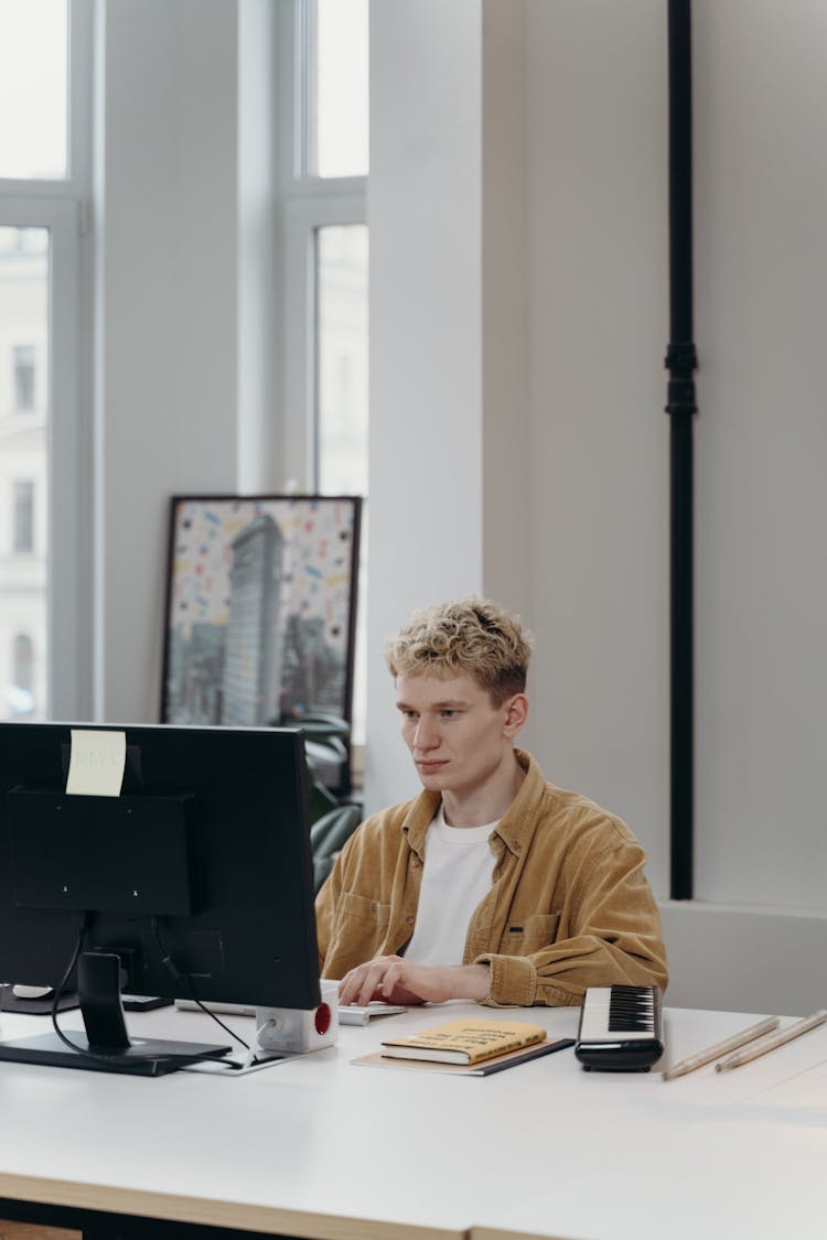 Man Working On A Computer