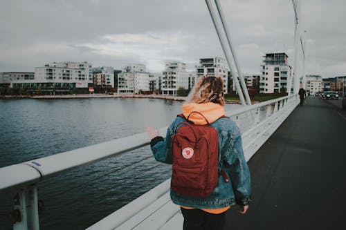 A Woman in Blue Denim Jacket