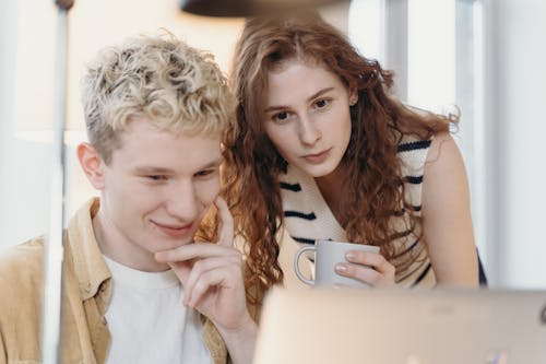 People Looking at the Laptop 