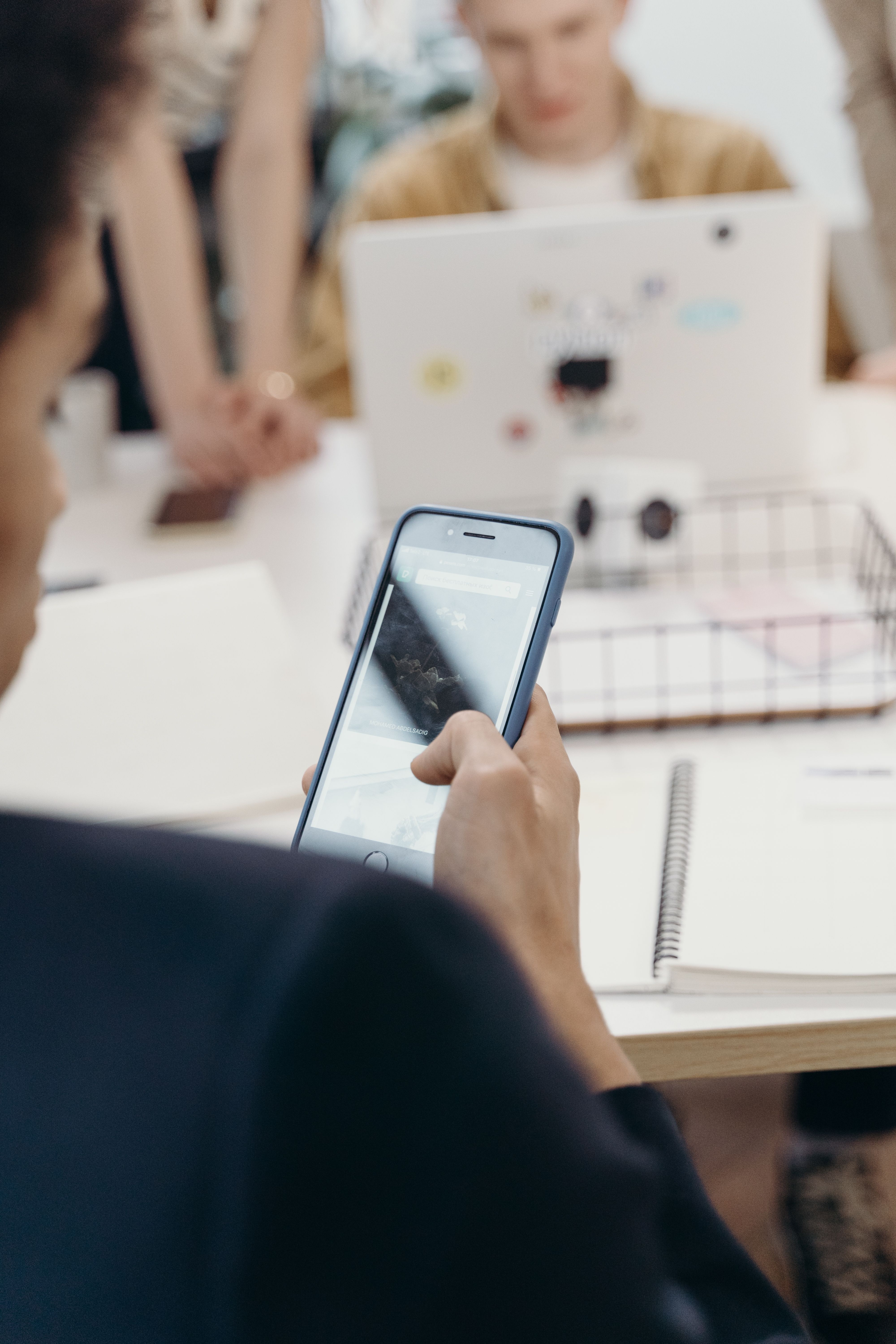 Person using a smartphone for digital communication
