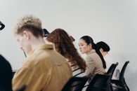 People Sitting on a Chair Working