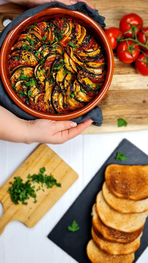 Free Overhead Shot of Ratatouille in a Brown Bowl Stock Photo