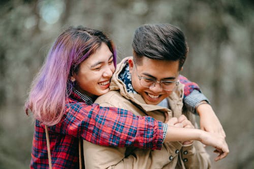 Woman Hugging Man from Behind