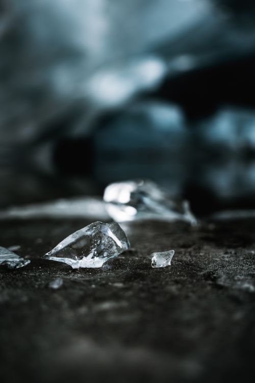 Free Artistic macro shot of ice shards on a textured surface, emphasizing texture and contrast. Stock Photo