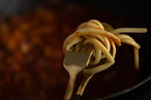 Close Up Photo of Pasta on a Fork