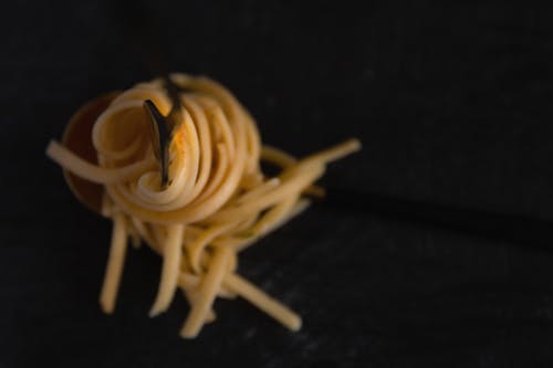 Close-Up Photograph of Pasta on a Fork