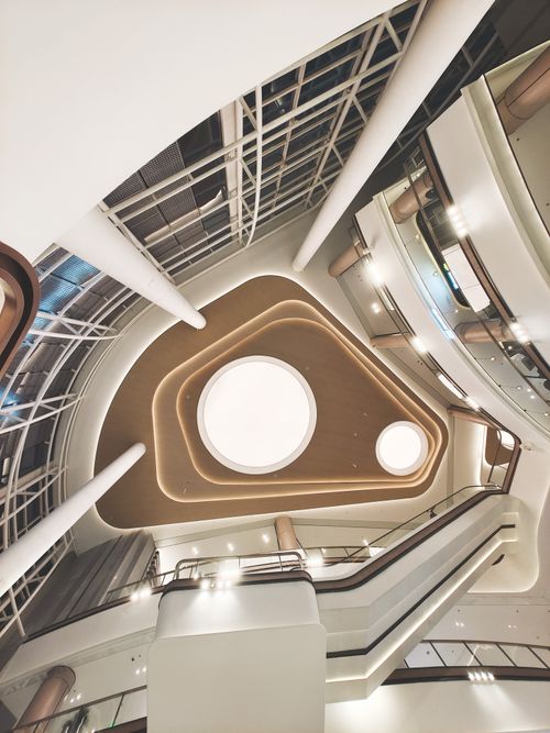 Free Sleek interior architecture of a mall in Beijing showcasing a modern design. Stock Photo
