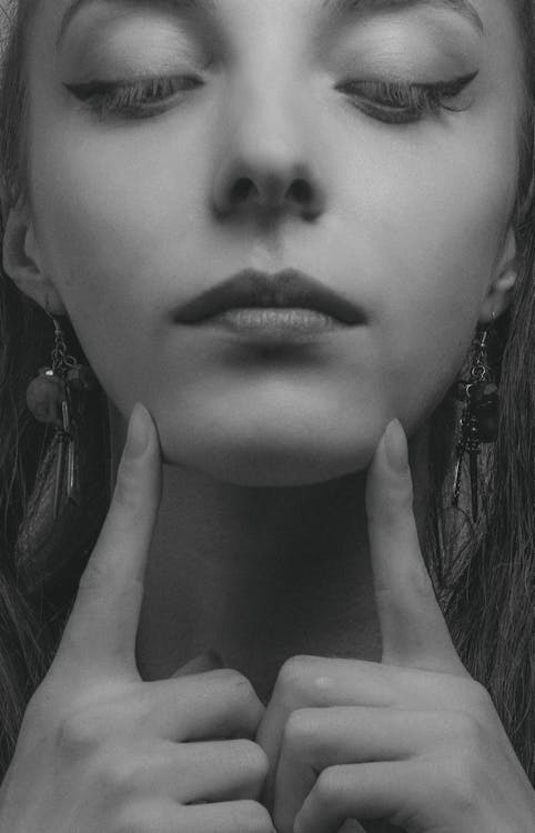 Grayscale Photo of Woman With Eyeliner
