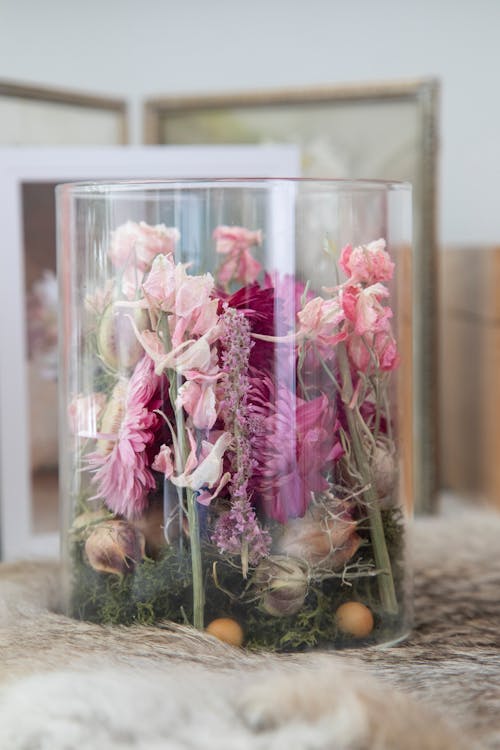 Pink Flowers in Clear Glass Jar