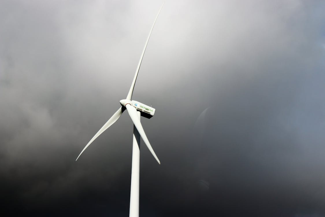 Free White Windmill Under Gray Cloudy Sky Stock Photo