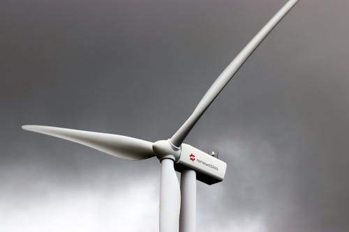 White 3-blade Windmill Under Cloudy Sky