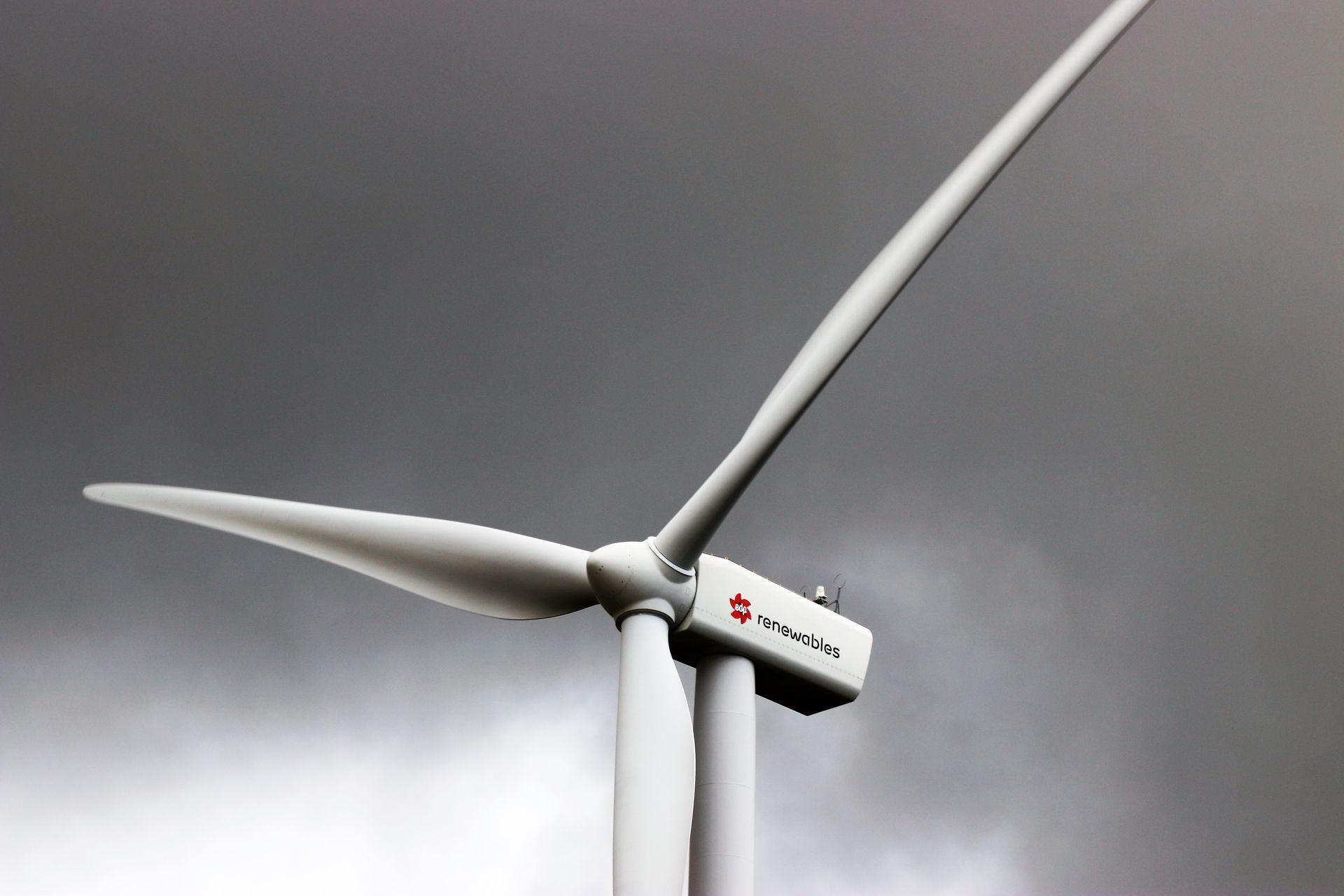 White 3-blade Windmill Under Cloudy Sky