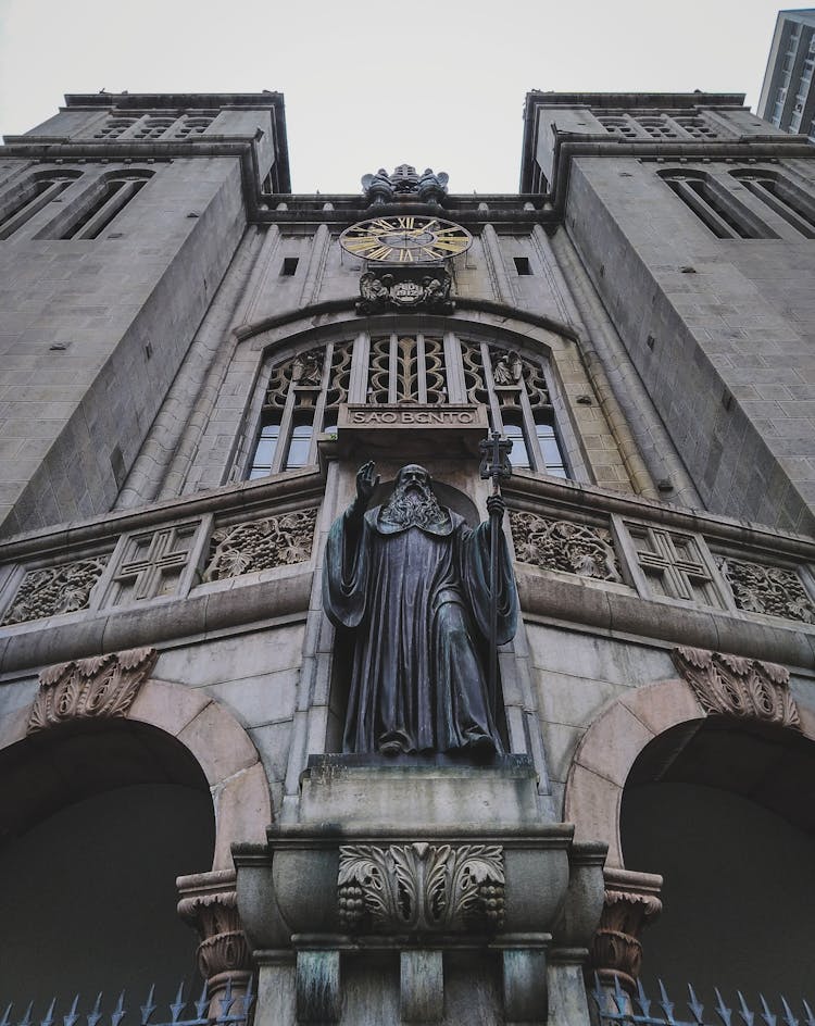 Exterior Of Catholic Monastery With Sculptures