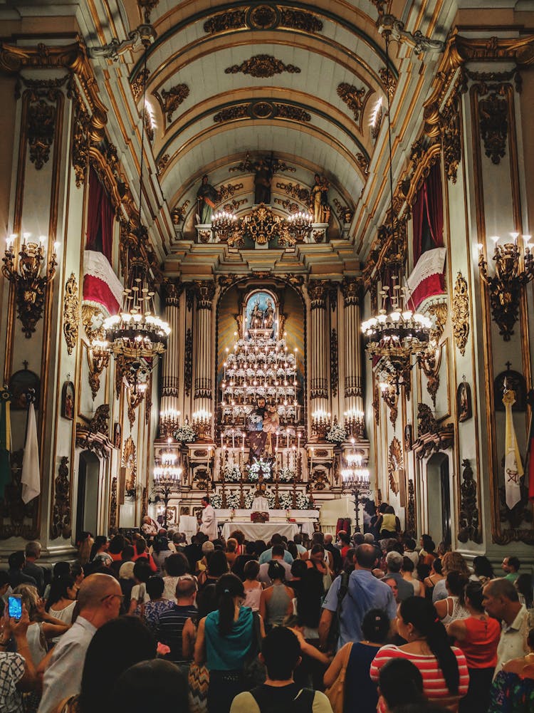 Interior Of Catholic Church With Worships