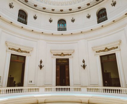 Low angle fragment of interior of historical building with white stone walls and arched windows in colonial style in Rio de Janeiro in Brazil