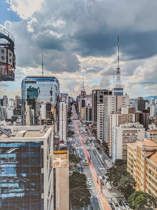 From above of modern district with contemporary glass towers and high rise buildings in cloudy day in Sao Paulo in Brazil