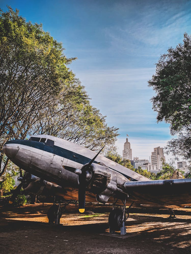 Old Airplane In Urban Park