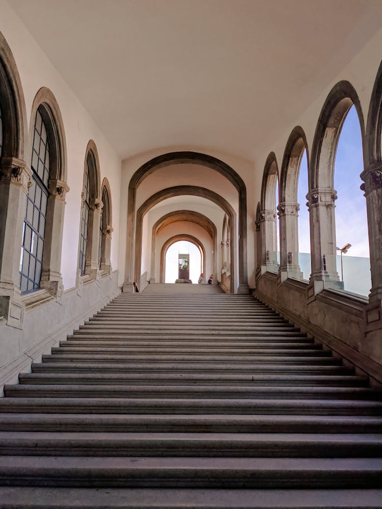 Science Museum Interior With Stairs Between Arched Windows