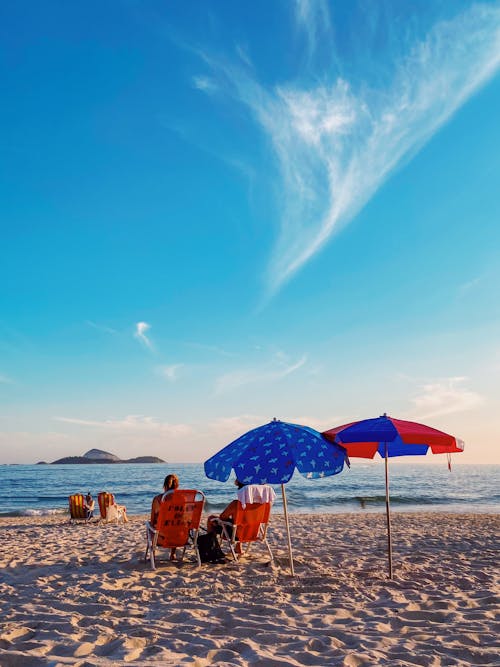 People Sitting on the Shore