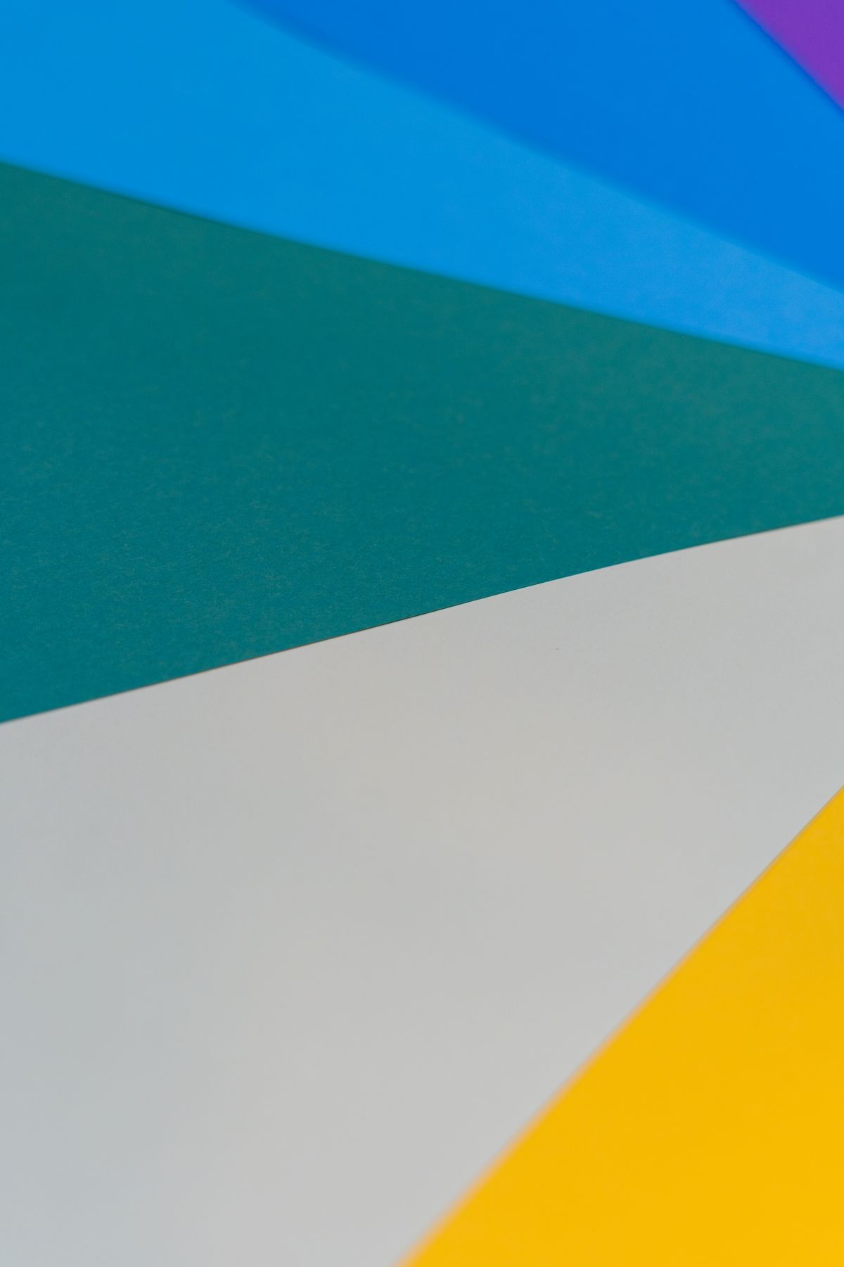 Teal, white and yellow colour blocks