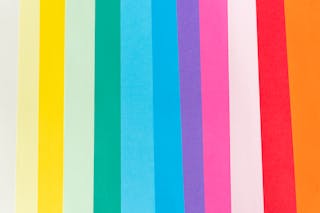 Top view of palette of vibrant colorful lines with different shades in row forming abstract background