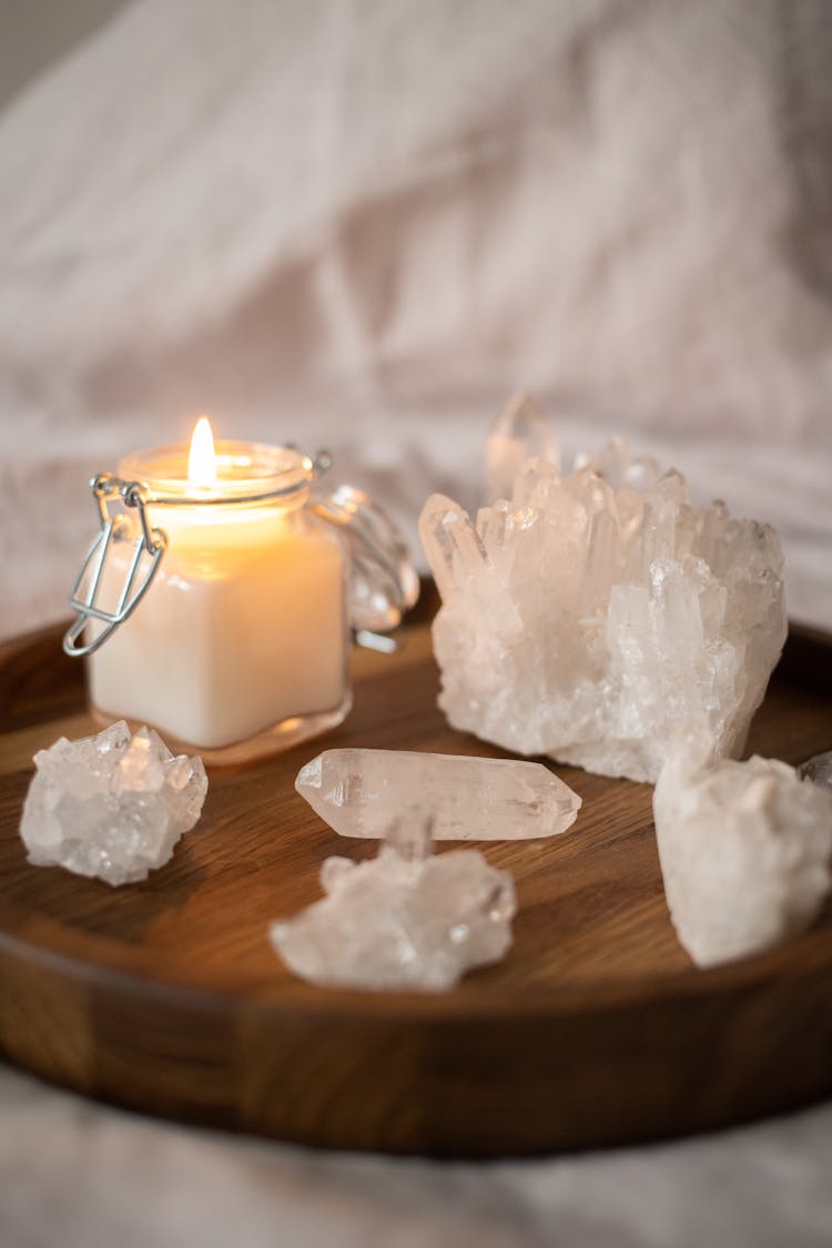 Lighted Candle On The Wooden Tray