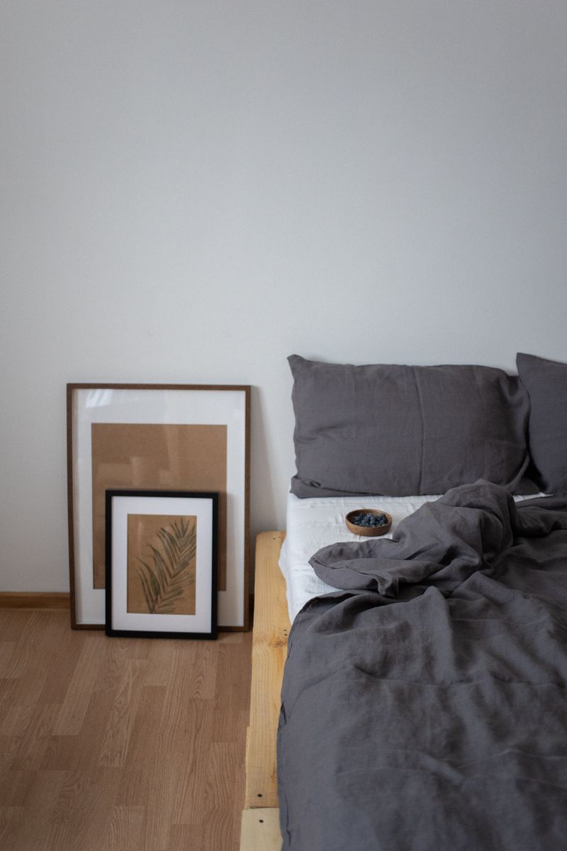 Minimalist bedroom with grey linen bedding