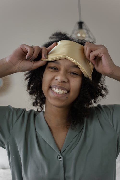 Free A Woman Smiling at the Camera Stock Photo