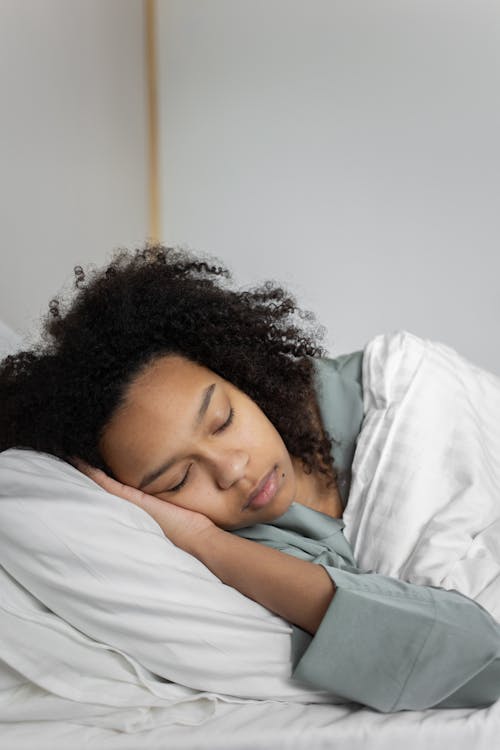 Free A Woman Sleeping Soundly Stock Photo