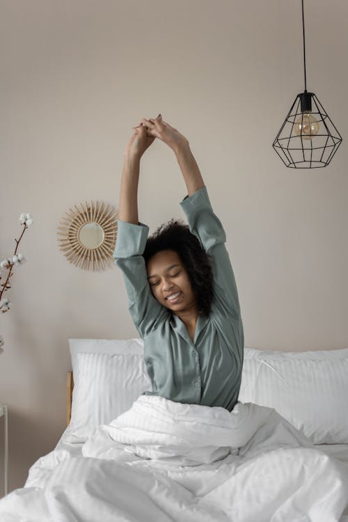Free A Woman Waking Up from Sleep Stock Photo