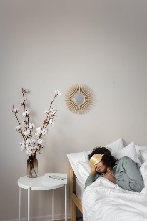 Free A Person Sleeping on the Bed Stock Photo