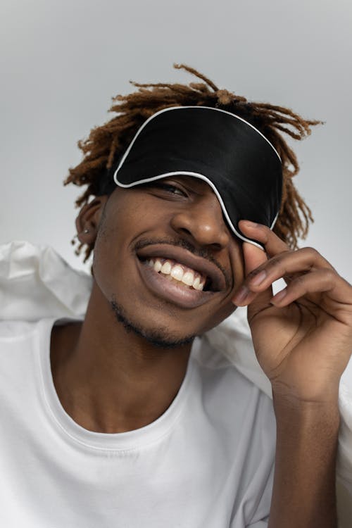 Free Photo of a Man Wearing Sleep Mask Stock Photo