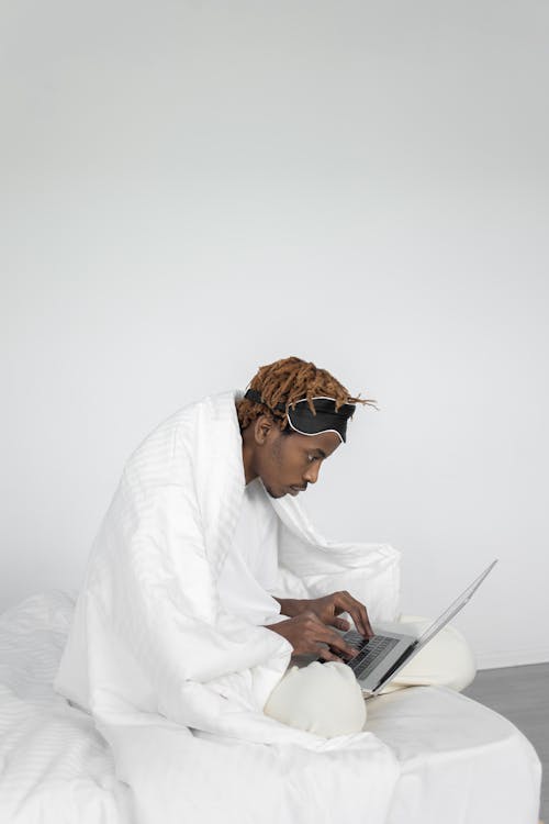 Free Man Using a Laptop  Stock Photo