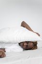 Woman Lying on Bed Covered With White Blanket