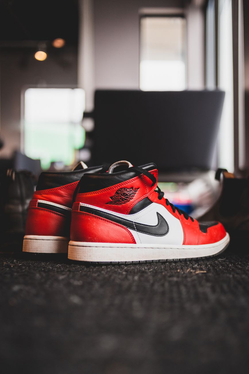 Stylish Red Sneakers Placed Dark Floor Footwear