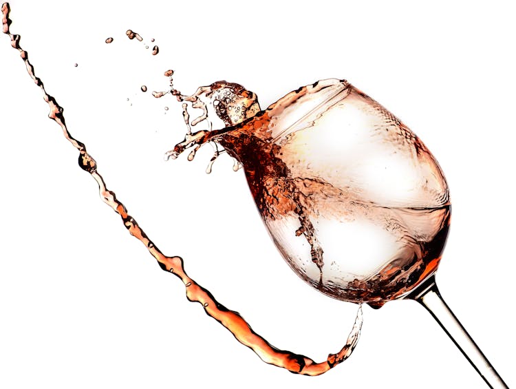 Photo Of Wine Spilling From A Glass