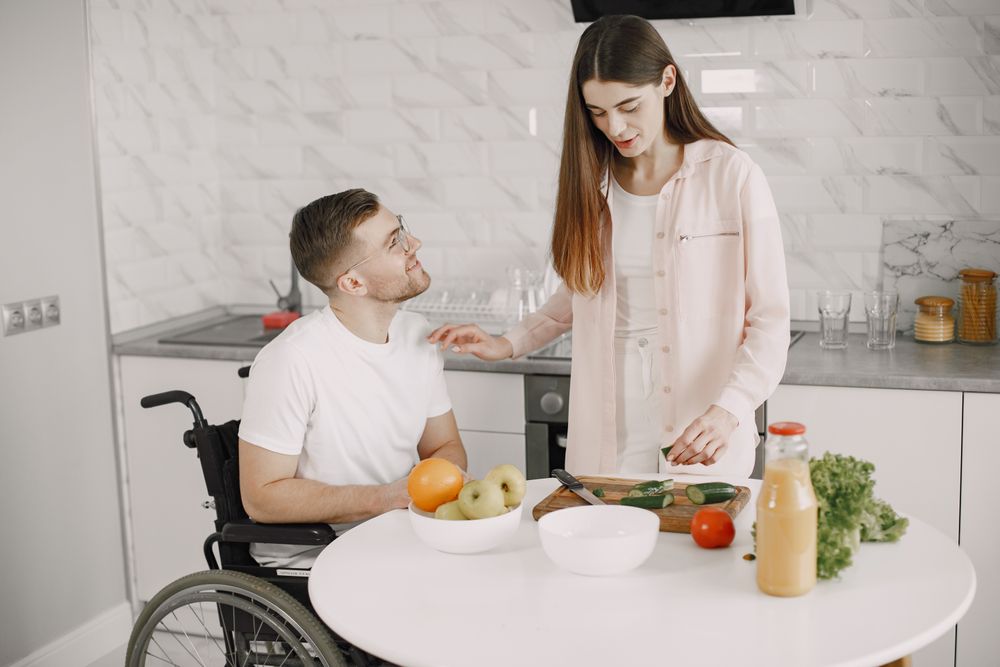 People preparing food together in an accessible kitchen