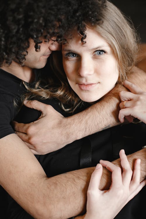 Free A Man Hugging His Partner Stock Photo