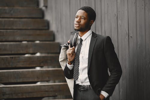 Free Close-Up Shot of a Man in Black Suit  Stock Photo