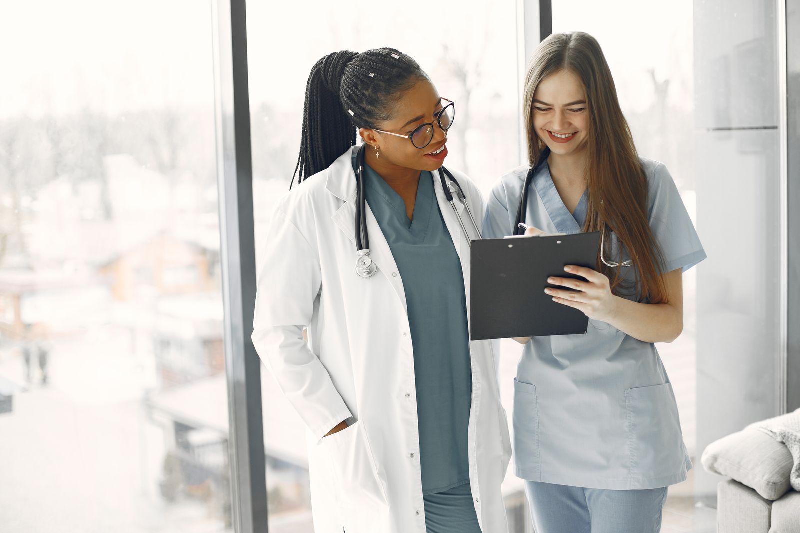 Healthcare professionals coordinating schedules and care documentation
