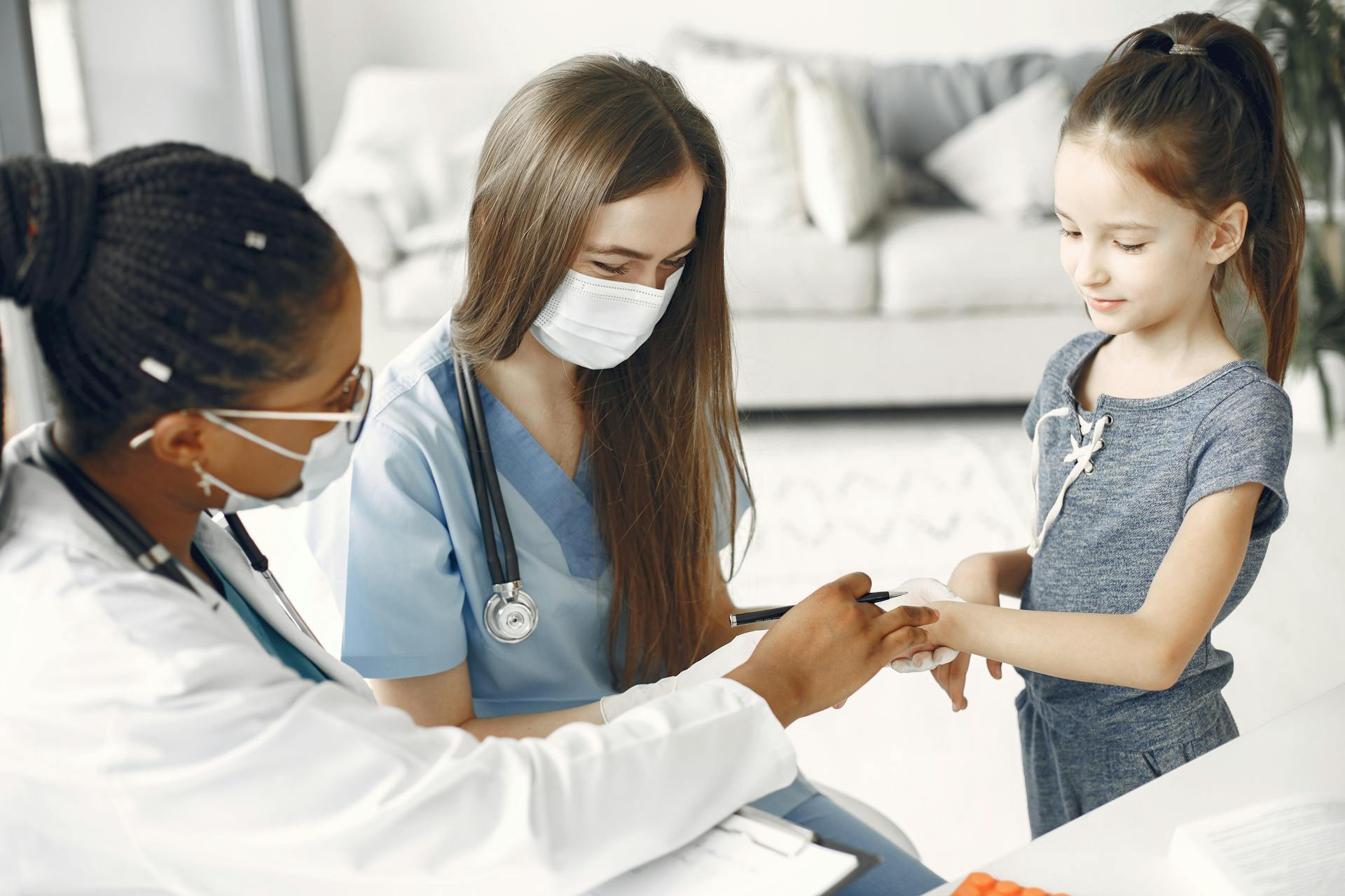 Little Girl at a Medical Checkup at Home