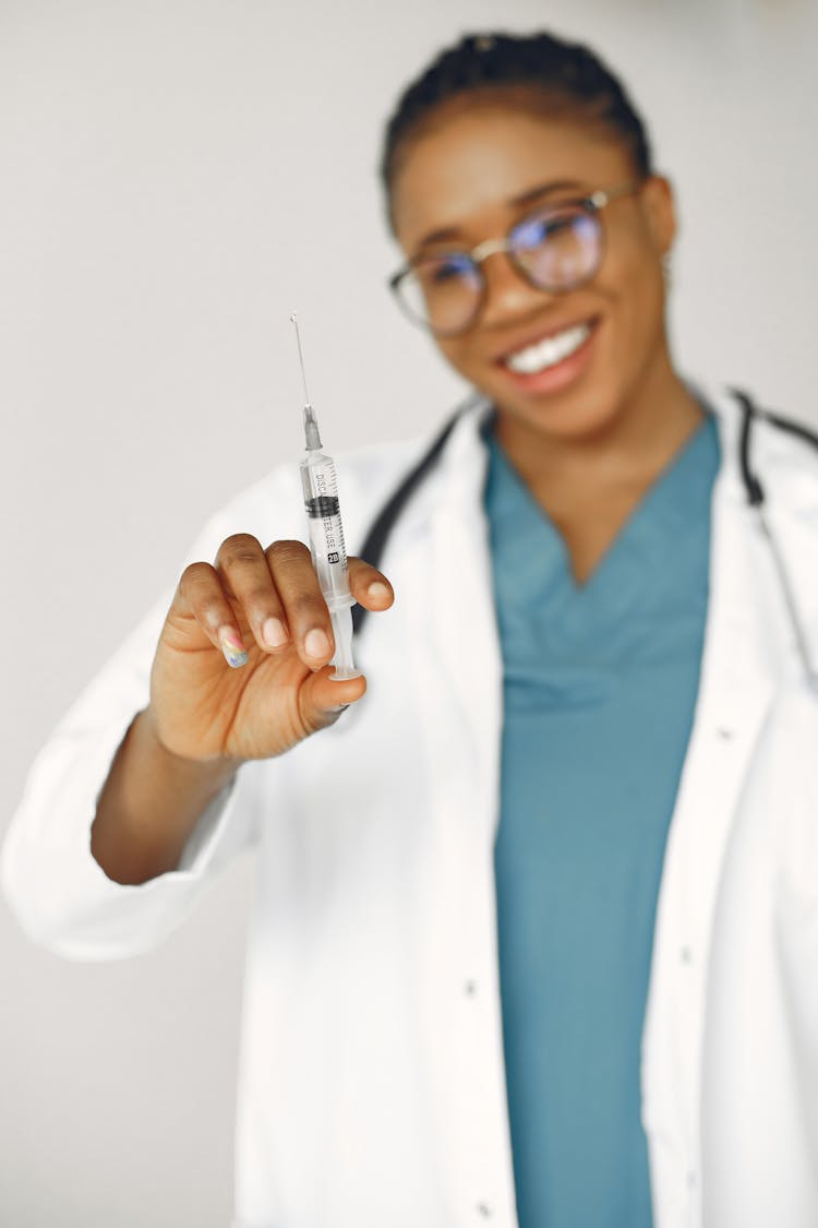 Nurse Holding Syringe With Vaccine